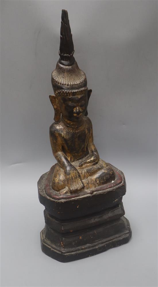 A 19th century Burmese giltwood carving of a Buddha height 56cm